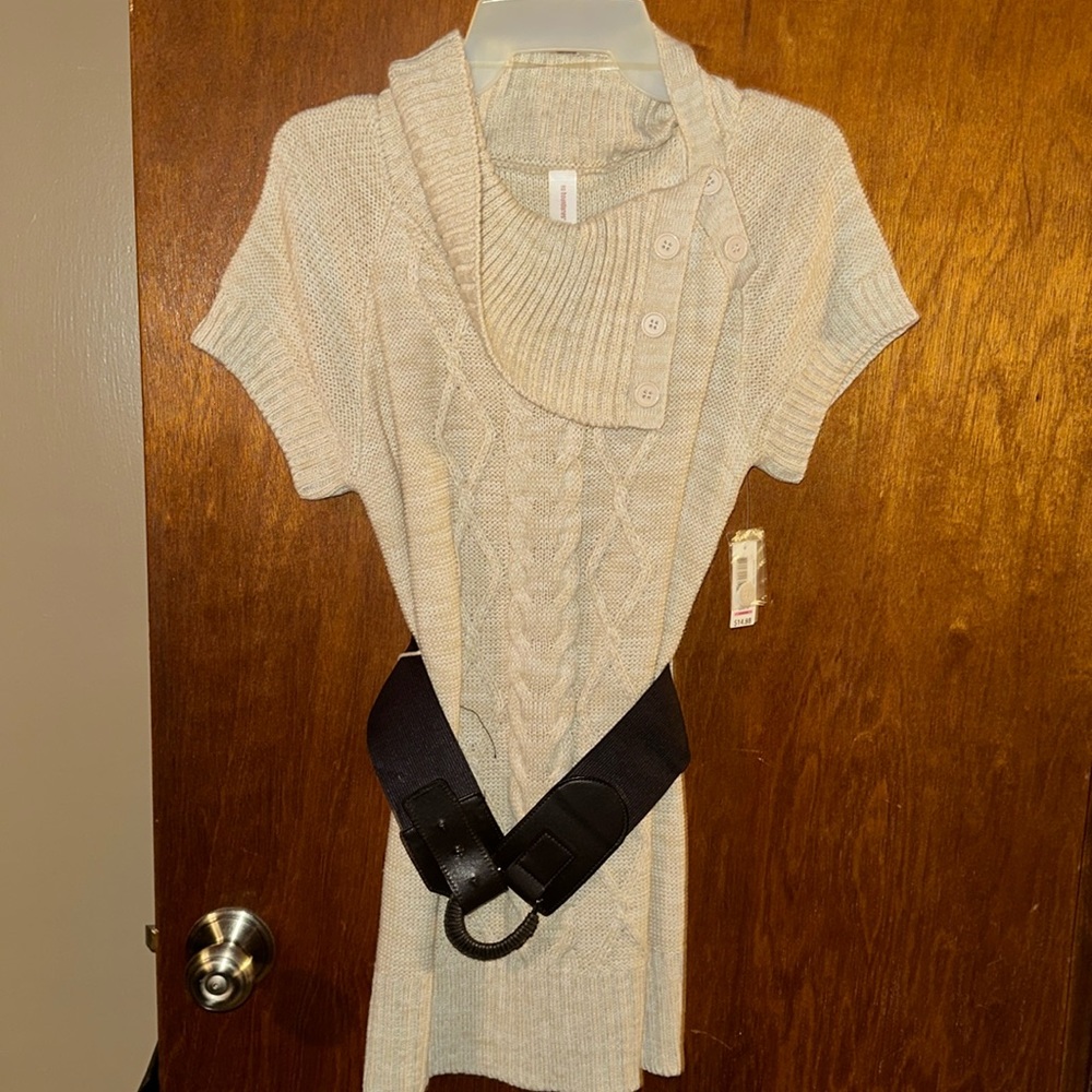 Woman’s sweater dress with belt.